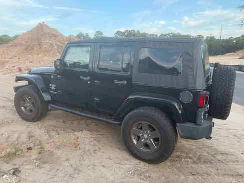 Used 2015 Jeep Wrangler Unlimited Sport AWD/4WD image 1