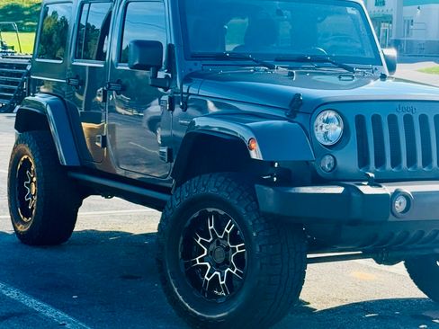 Used 2016 Jeep Wrangler Unlimited Sport image 1
