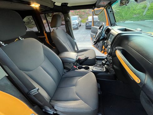 Used 2012 Jeep Wrangler Unlimited Sport w/ Black Appearance Group AWD/4WD image 17