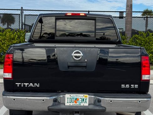 Used 2010 Nissan Titan SE w/ SE Premium Utility Pkg image 4