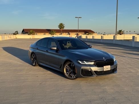 Used 2022 BMW M550i xDrive w/ Executive Package image 1