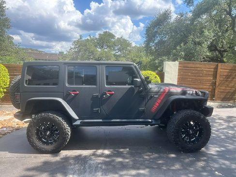 Used 2013 Jeep Wrangler Unlimited Sport AWD/4WD image 1