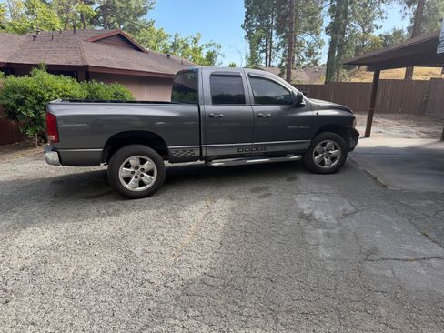 Used 2004 Dodge Ram 1500 Truck SLT w/ Big Horn Quad Cab Value Group RWD image 1