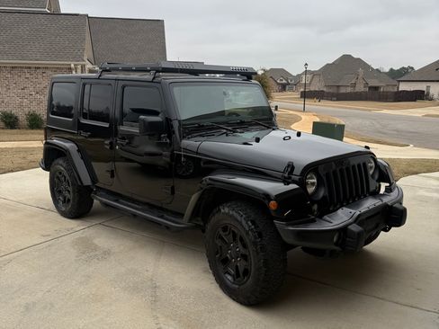 Used 2016 Jeep Wrangler Unlimited Sahara image 1