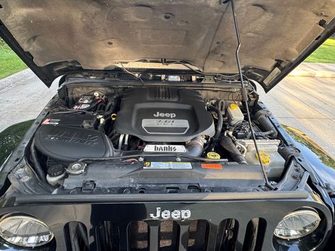Used 2012 Jeep Wrangler Unlimited Sahara w/ Dual Top Group AWD/4WD image 12