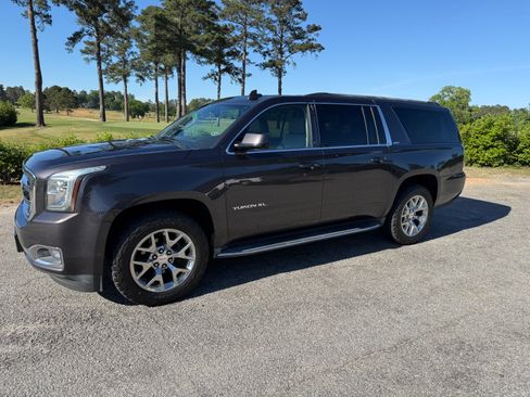 Used 2015 GMC Yukon XL SLT w/ Open Road Package AWD/4WD image 1