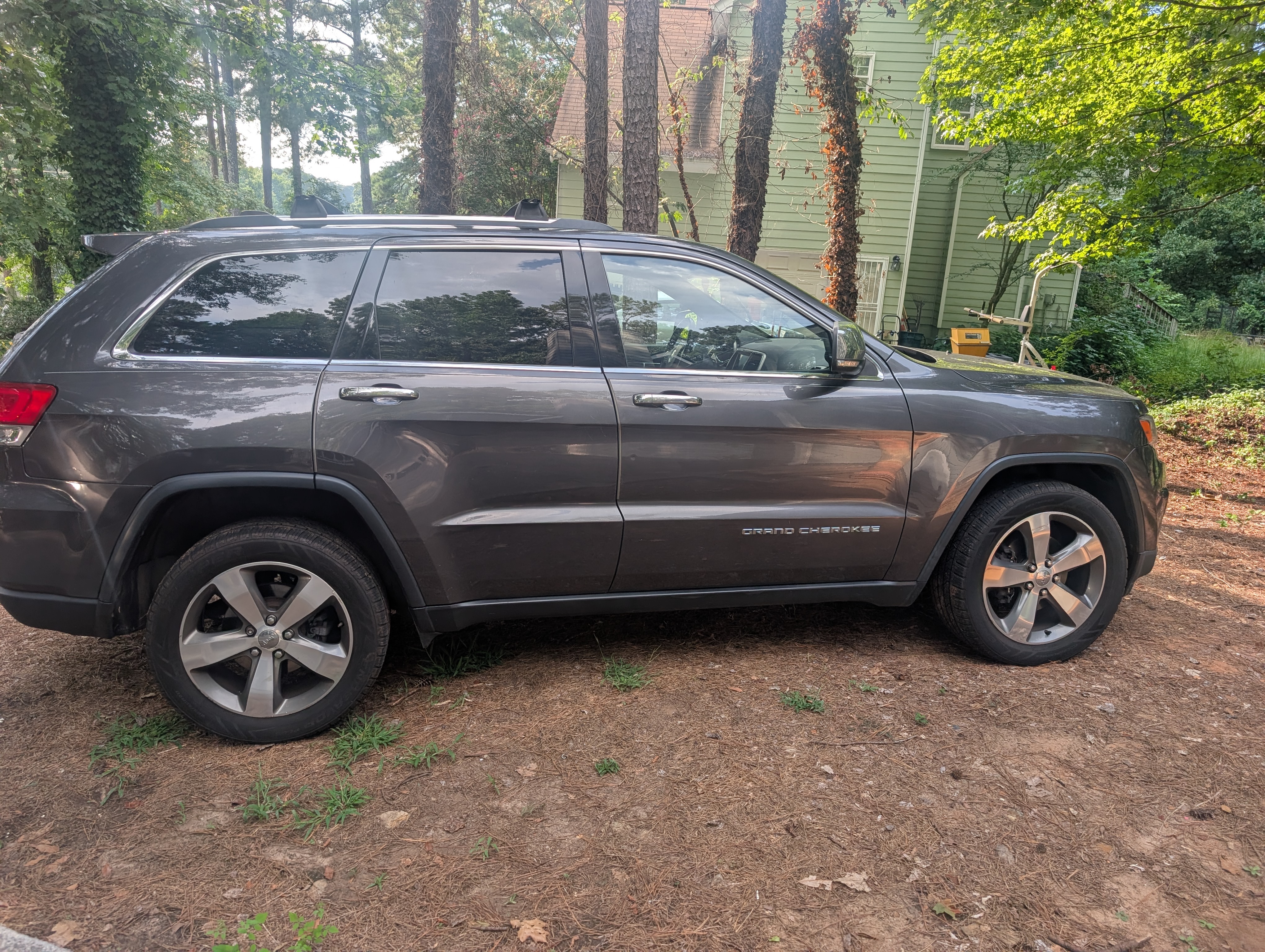 Used 2015 Jeep Grand Cherokee Limited AWD/4WD image 1