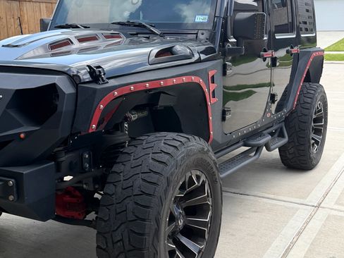 Used 2015 Jeep Wrangler Unlimited Sahara AWD/4WD image 1