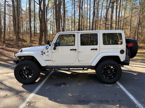 Used 2011 Jeep Wrangler Unlimited Sport image 1