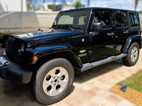 Used 2014 Jeep Wrangler Unlimited Sahara w/ Connectivity Group image 1