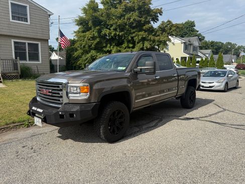 Used 2015 GMC Sierra 2500 SLT w/ Duramax Plus Package AWD/4WD image 1