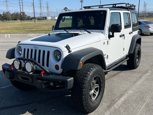 Used 2012 Jeep Wrangler Unlimited Sport w/ PWR Convenience Group image 1