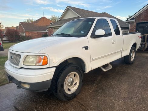 Used 1999 Ford F150 4x4 SuperCab image 1