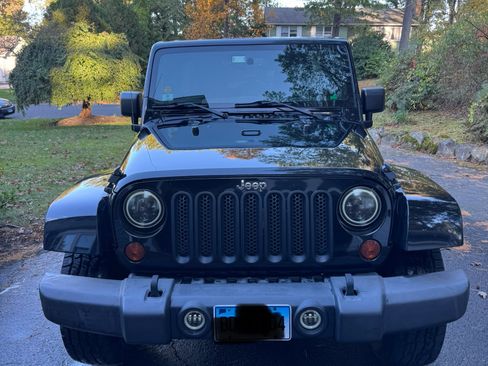 Used 2013 Jeep Wrangler Unlimited Sahara w/ Dual Top Group image 2