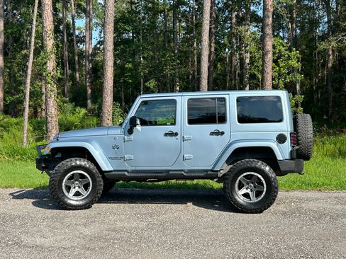 Used 2012 Jeep Wrangler Unlimited Sahara AWD/4WD image 1