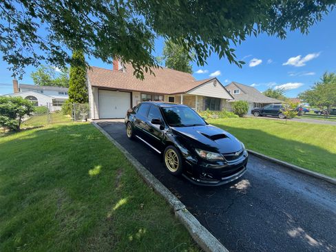 Used 2011 Subaru Impreza WRX Sedan AWD/4WD image 1