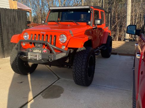 Used 2015 Jeep Wrangler Unlimited Sahara w/ Max Tow Package image 1
