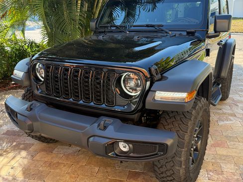 Used 2024 Jeep Wrangler Sport image 2