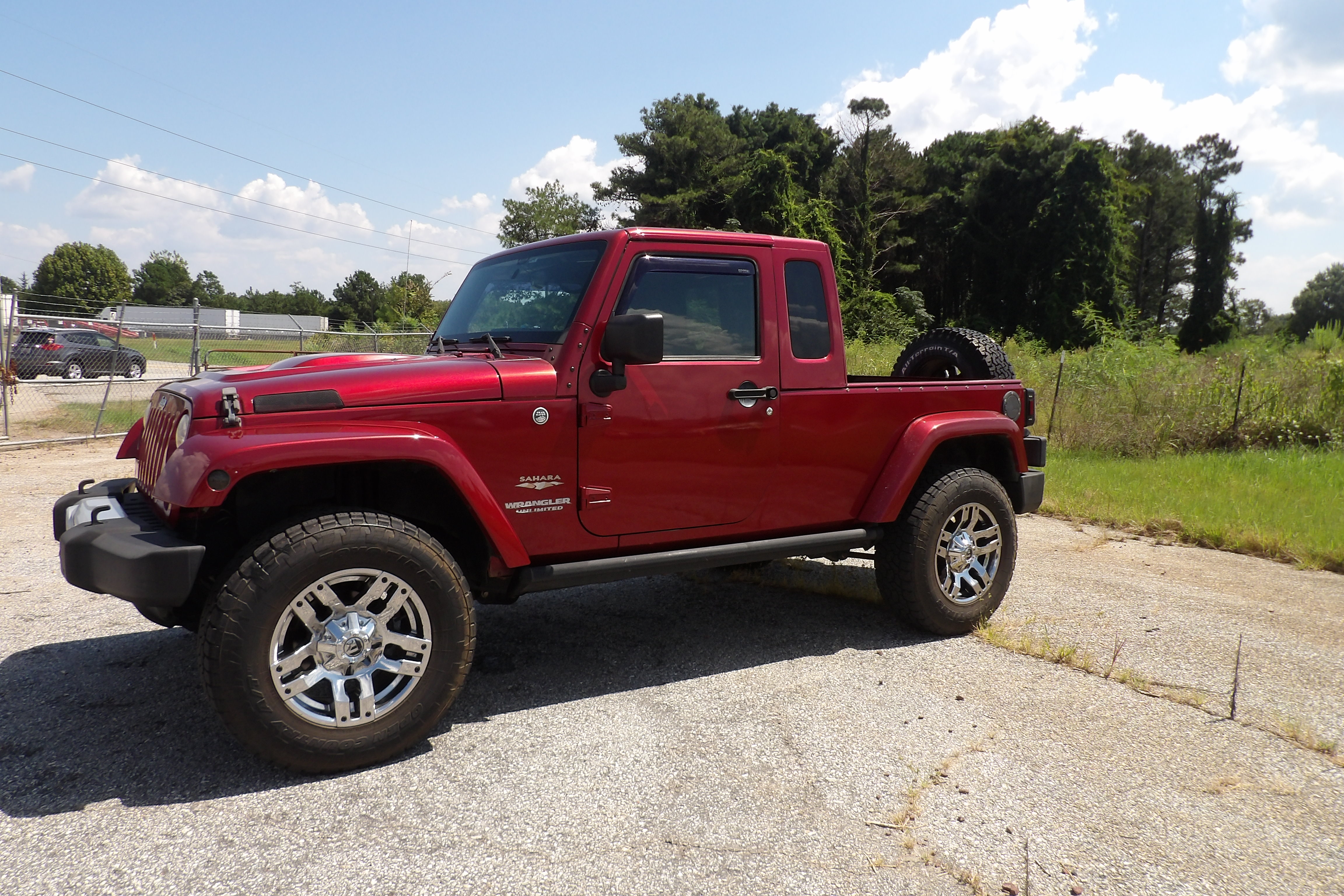 Used 2012 Jeep Wrangler Unlimited Sahara AWD/4WD image 1