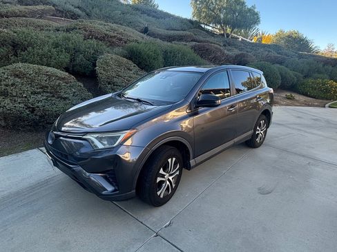 Used 2018 Toyota RAV4 LE w/ Carpet Mat Package image 1