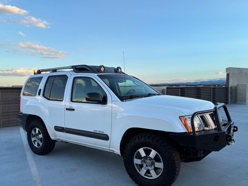 Used 2009 Nissan Xterra Off-Road w/ Tow Pkg AWD/4WD image 1