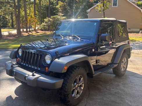 Used 2013 Jeep Wrangler Sport image 1