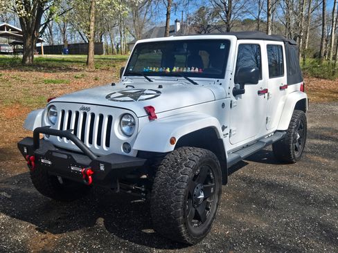 Used 2015 Jeep Wrangler Unlimited Sport image 1