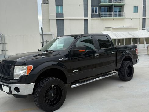 Used 2014 Ford F150 XLT w/ Equipment Group 302A Luxury AWD/4WD image 1