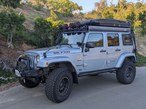 Used 2012 Jeep Wrangler Unlimited Sahara AWD/4WD image 1