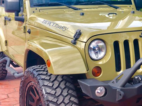 Used 2013 Jeep Wrangler Unlimited Sahara w/ Mopar Chrome Edition Group image 2