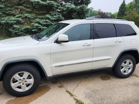 Used 2012 Jeep Grand Cherokee Laredo w/ Laredo E Group AWD/4WD image 1