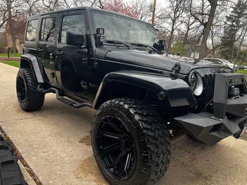 Used 2016 Jeep Wrangler Unlimited Sahara w/ Connectivity Group image 1