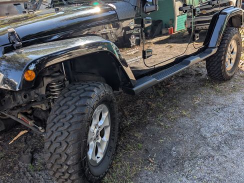 Used 2013 Jeep Wrangler Unlimited Sahara w/ Dual Top Group image 1