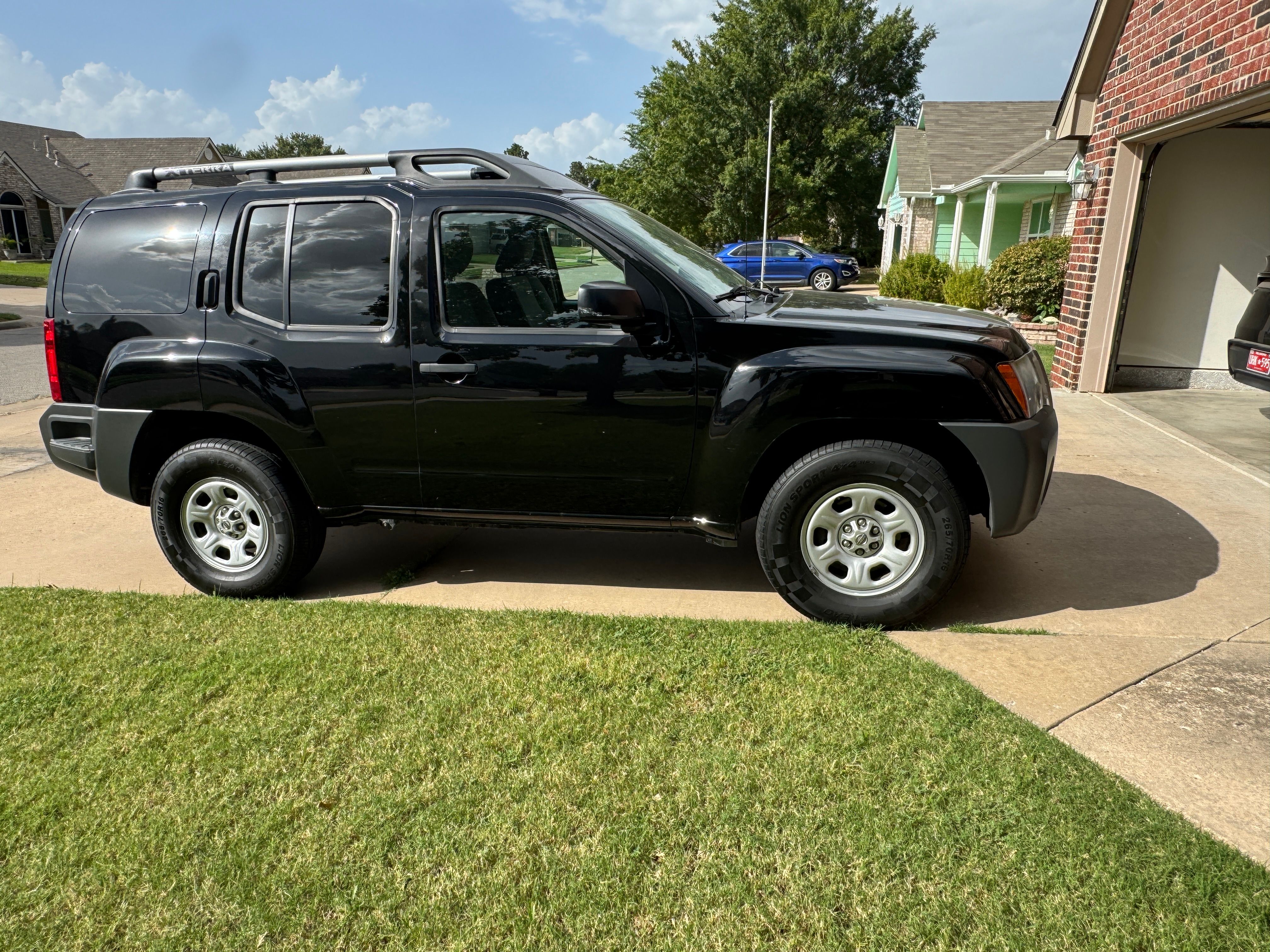 Used 2014 Nissan Xterra X AWD/4WD image 1