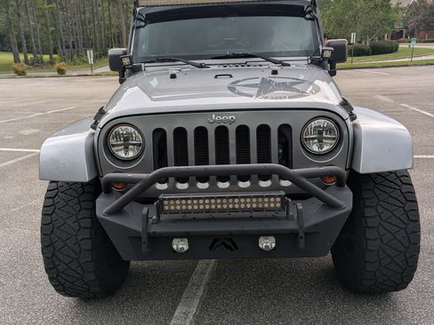 Used 2013 Jeep Wrangler Unlimited Sport AWD/4WD image 1