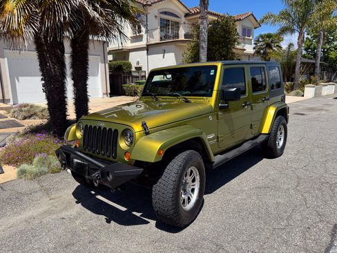 Used 2007 Jeep Wrangler Unlimited Sahara w/ Dual Top Group AWD/4WD image 1