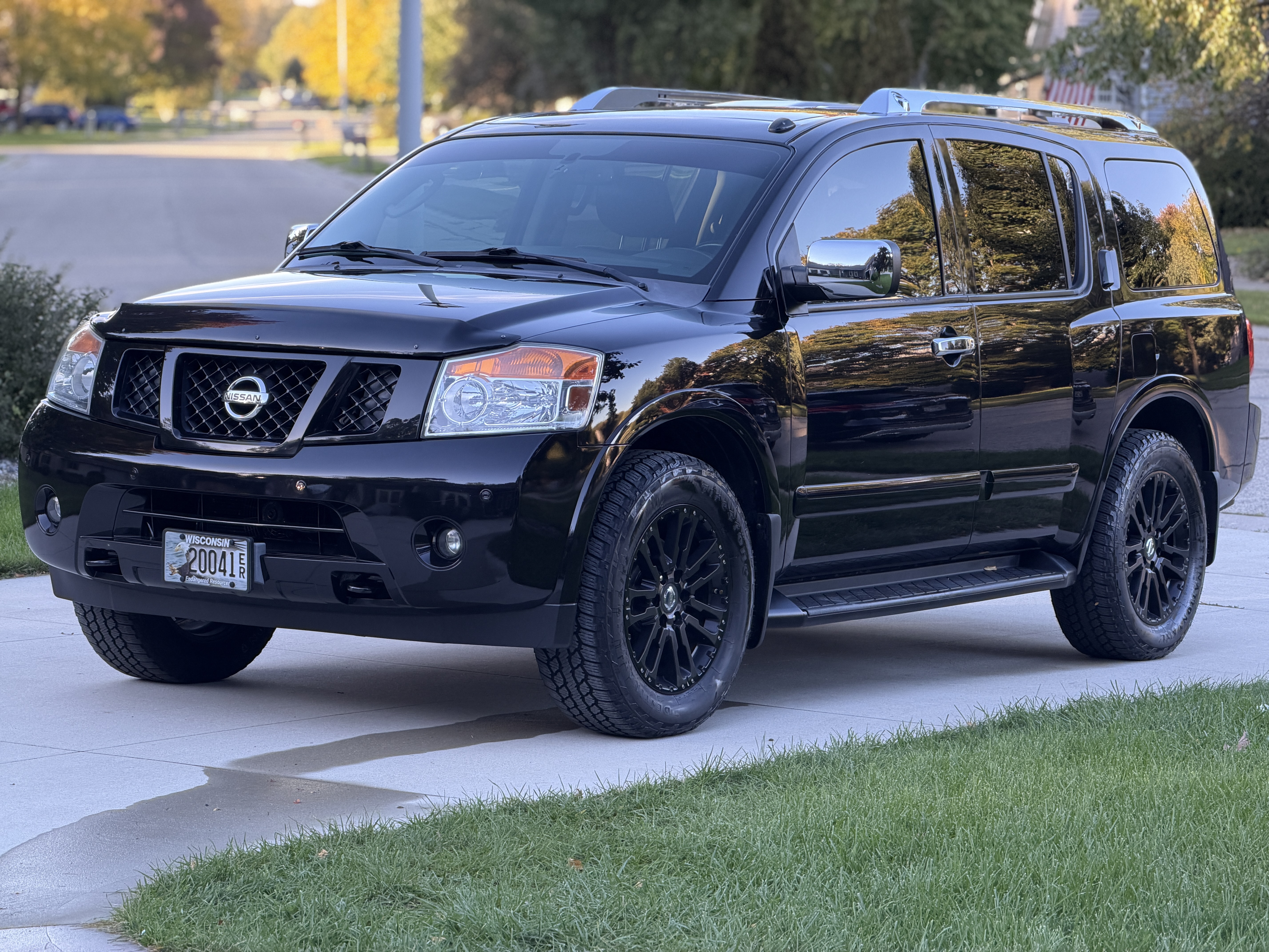 Used 2012 Nissan Armada Platinum AWD/4WD image 1