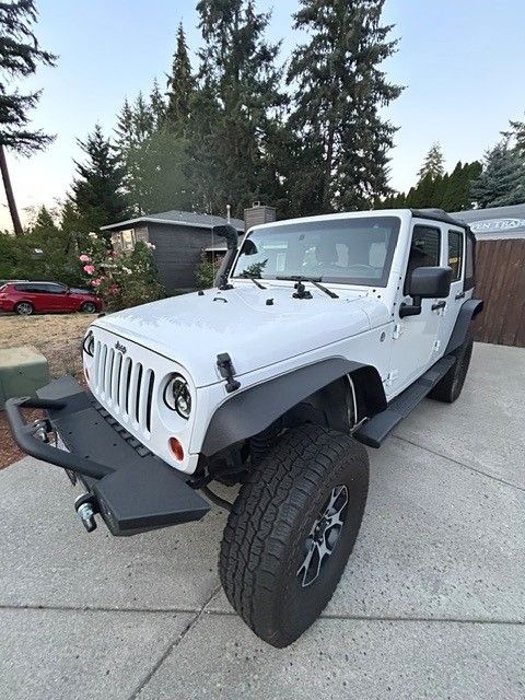 Used 2013 Jeep Wrangler Unlimited Sport w/ Connectivity Group AWD/4WD image 1