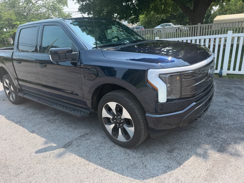 Used 2023 Ford F150 Lightning Platinum AWD/4WD image 1