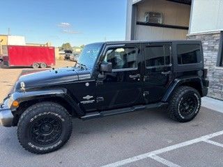 Used 2014 Jeep Wrangler Unlimited Sport AWD/4WD image 1