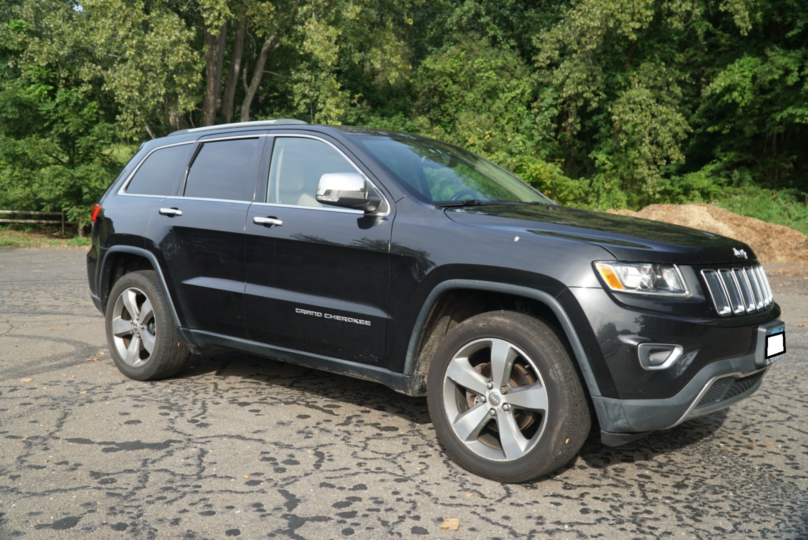 Used 2014 Jeep Grand Cherokee Limited AWD/4WD image 1