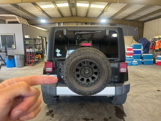 Used 2013 Jeep Wrangler Unlimited Sahara AWD/4WD image 4