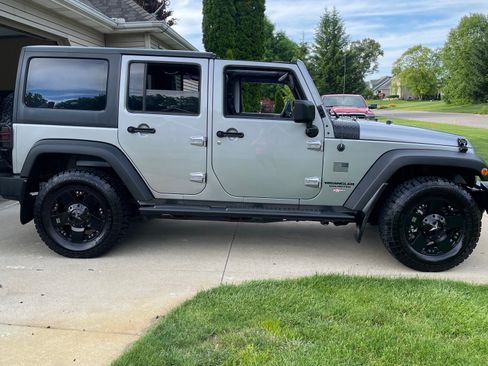 Used 2013 Jeep Wrangler Unlimited Sport AWD/4WD image 1