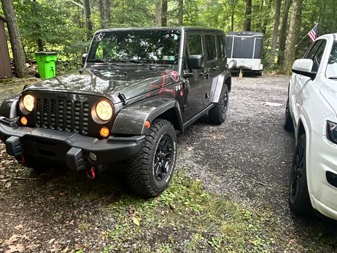 Used 2016 Jeep Wrangler Unlimited Sahara AWD/4WD image 1