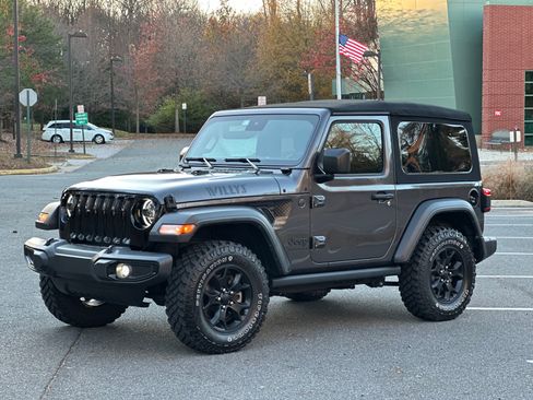 Used 2023 Jeep Wrangler Sport image 1