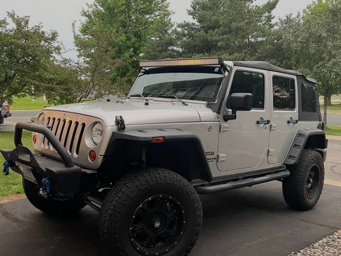 Used 2012 Jeep Wrangler Unlimited Sport AWD/4WD image 29