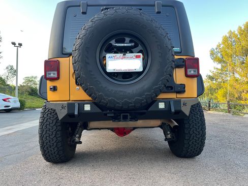 Used 2012 Jeep Wrangler Unlimited Sport w/ Black Appearance Group AWD/4WD image 10