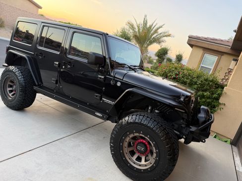 Used 2012 Jeep Wrangler Unlimited Sport AWD/4WD image 28