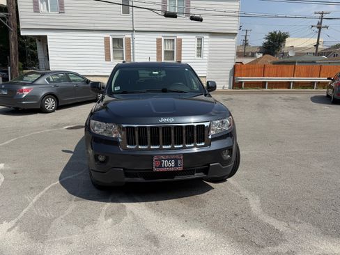 Used 2013 Jeep Grand Cherokee Laredo w/ Laredo E Group AWD/4WD image 1
