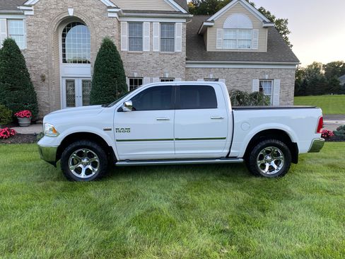 Used 2015 RAM 1500 Laramie w/ Convenience Group AWD/4WD image 1